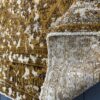 alfombra-vintage-desgastada-persa-dorada-textura